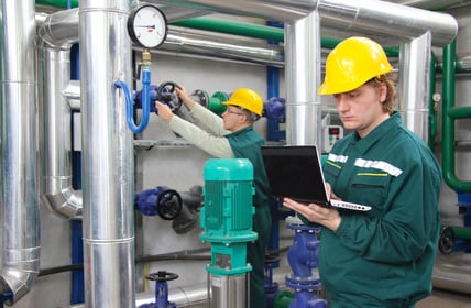 Industrial workers in a factory, teamwork