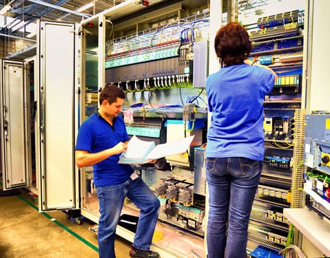 workers-industrial-control-panel-plc